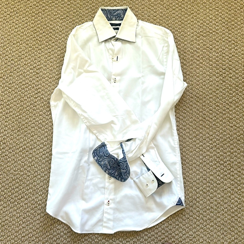 Paisley pattern behind collar and on cuffs